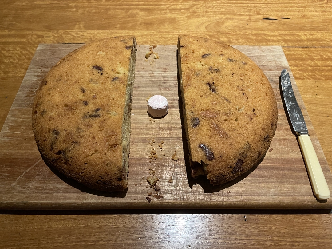 massive cookie, now cut in half and with a marshmallow in the middle